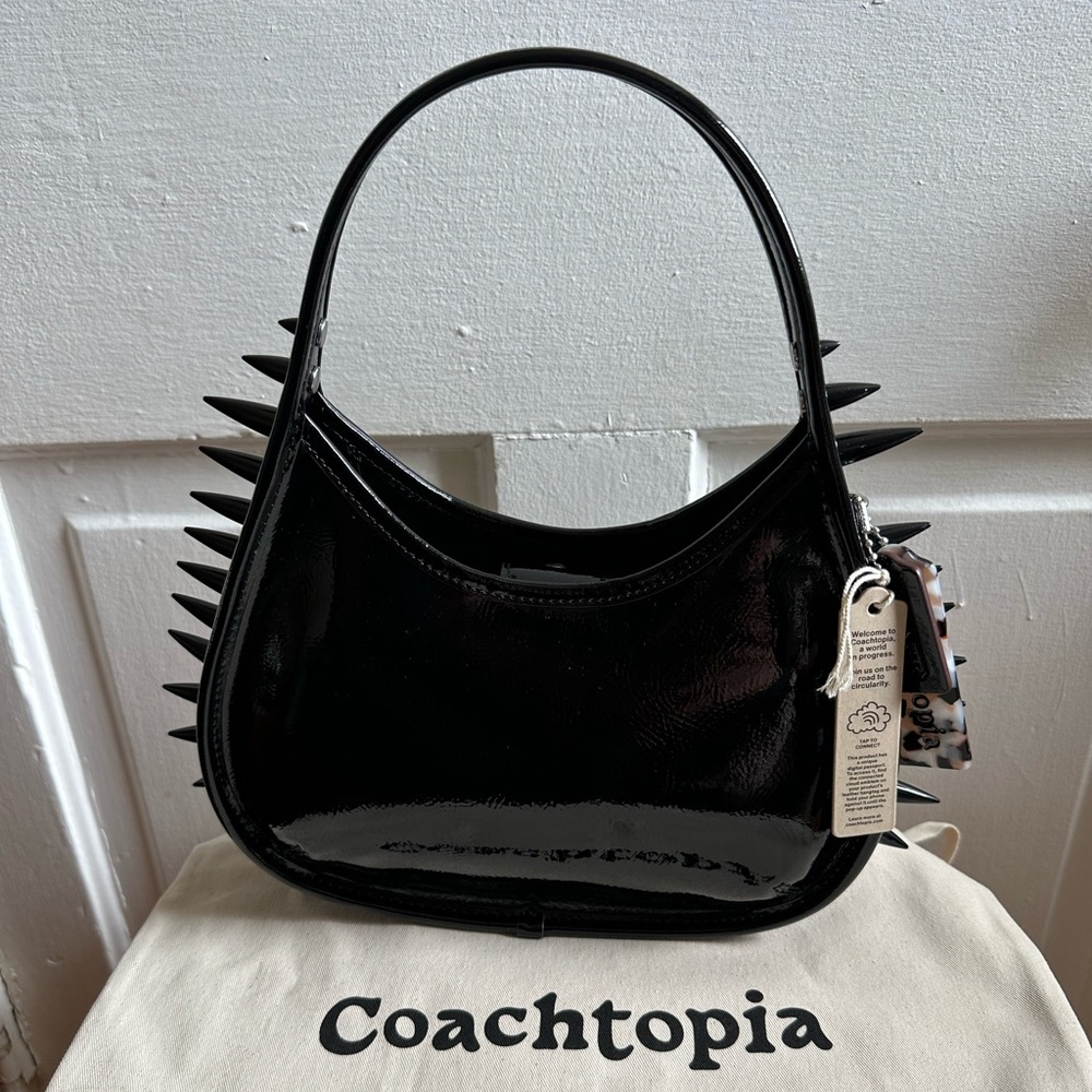 Coachtopia Spikes All Over Ergo bag